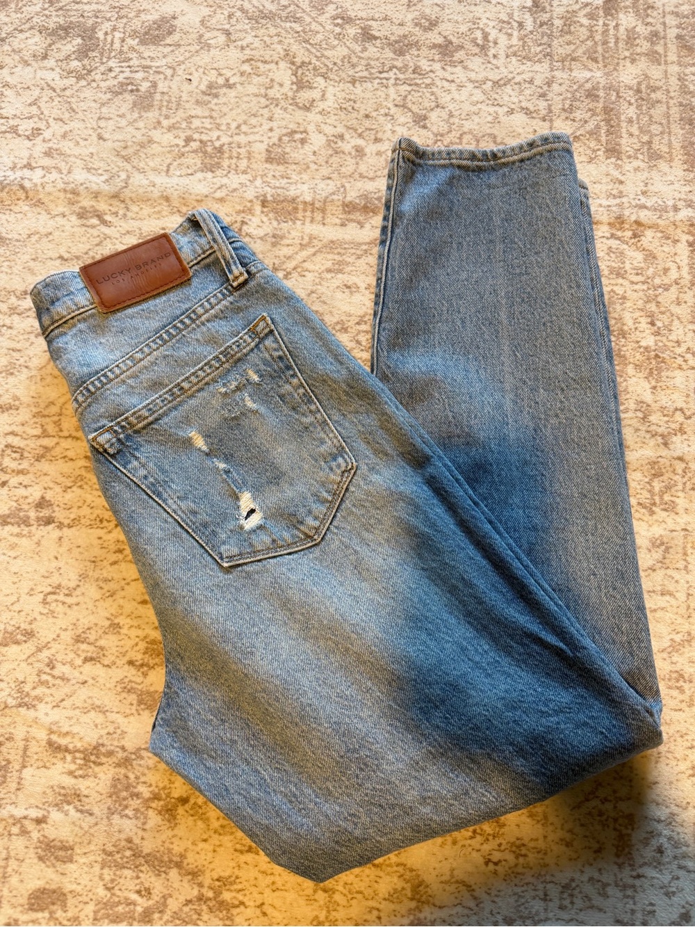 Lucky Brand Light Blue Relaxed Fit Jeans with Back Pocket Distress